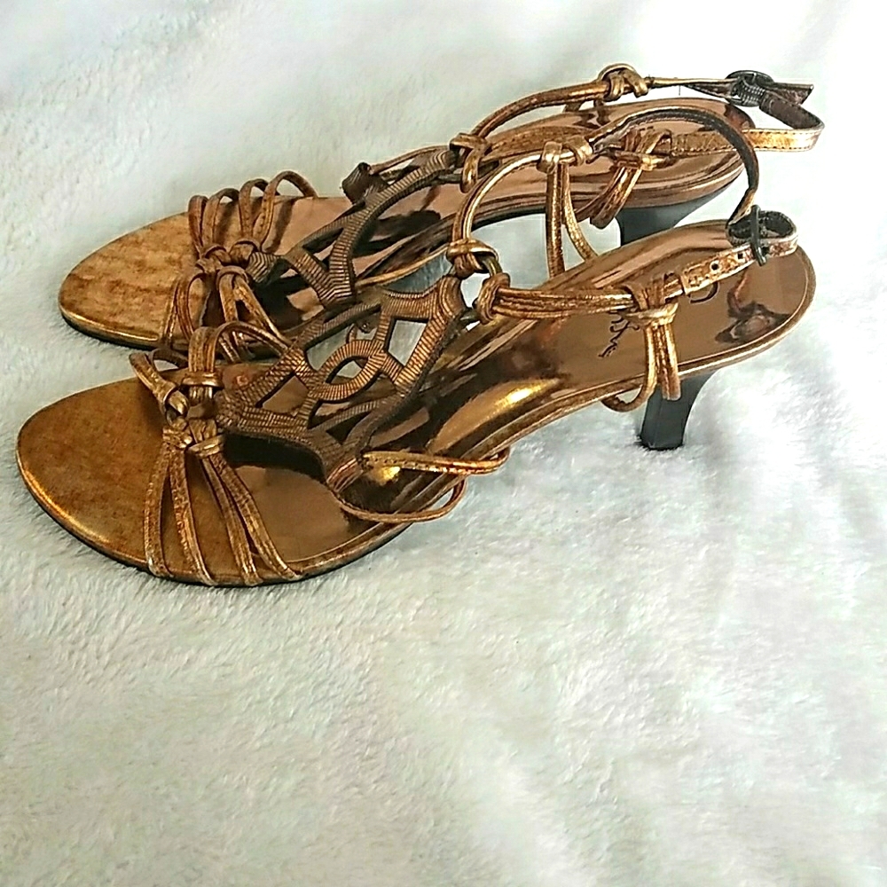 Carlos Santana gold heels.Like new.